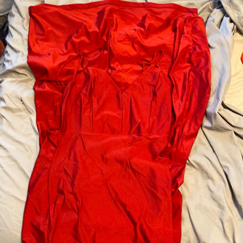 This is a very bright dress that scrunchies towards the lower of your back.